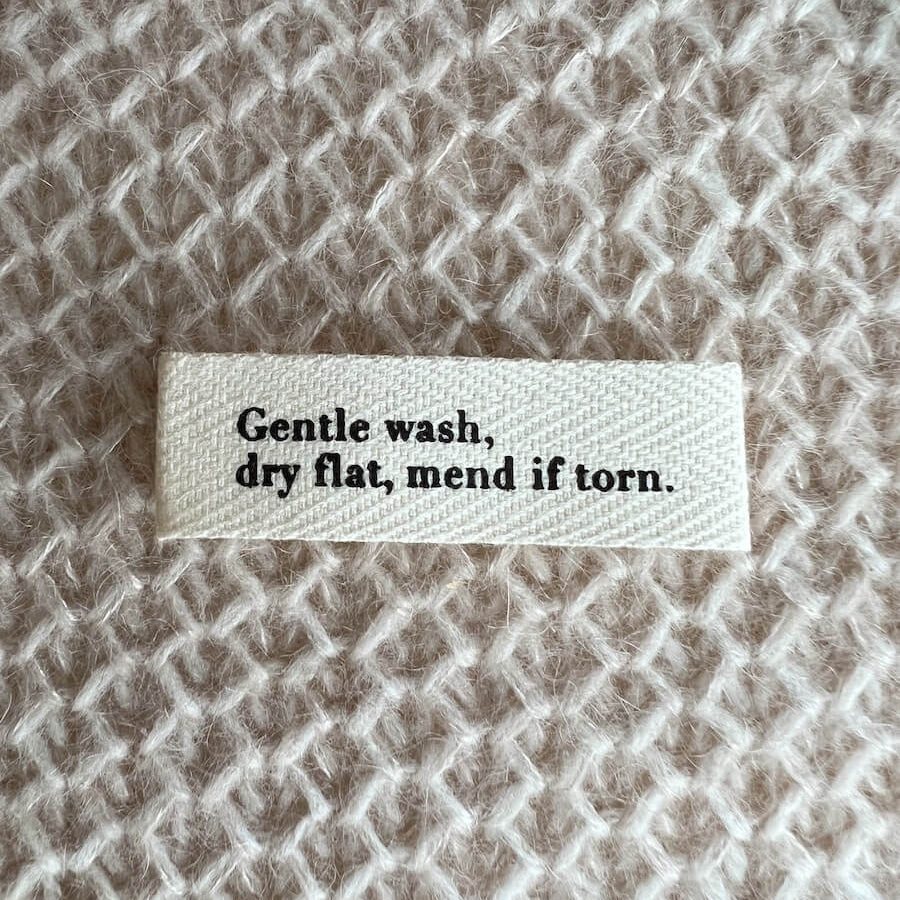 Gentle wash, dry flat, mend if torn Label - Petiteknit