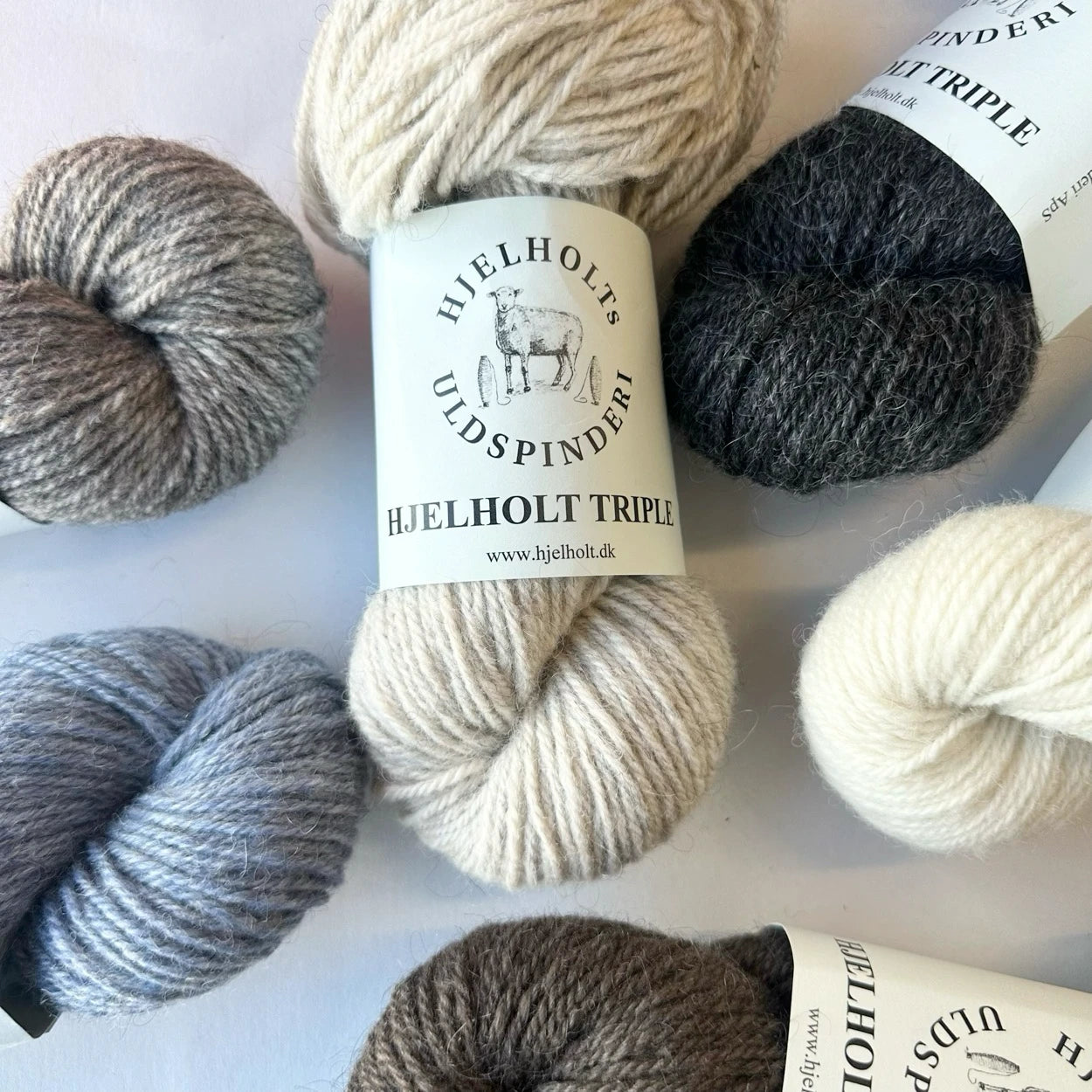 Triple - Hjelholt
